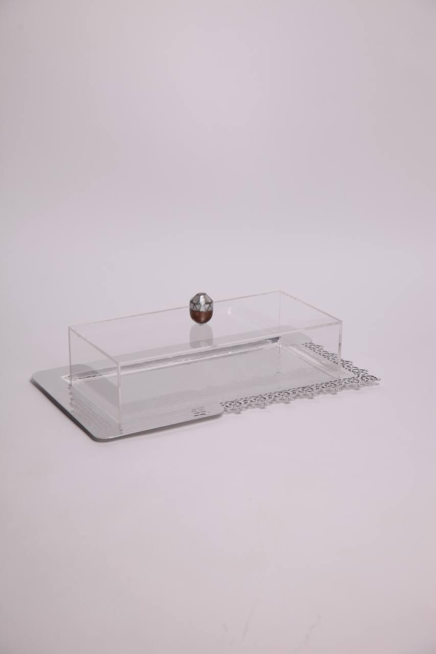 Rectangular metal tray with lace pattern and plexiglass cover